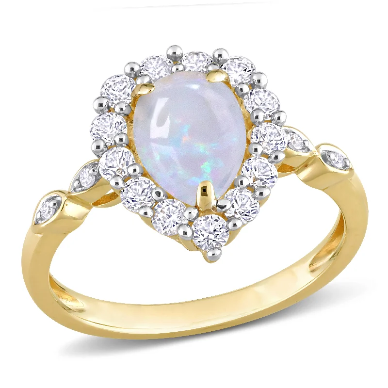 Rune mark ring-1 1/2 CT TGW Pear Shape Opal and Created White Sapphire and Diamond Accent Halo Ring in 10K Yellow Gold