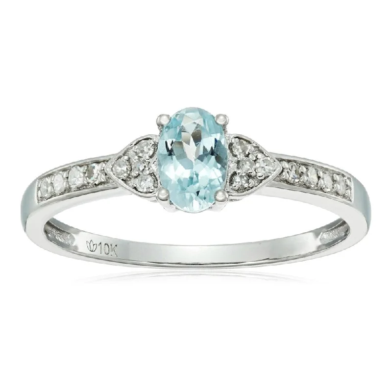 Chipped rim ring-10k White Gold Aquamarine Oval and Diamond Solitaire Ring