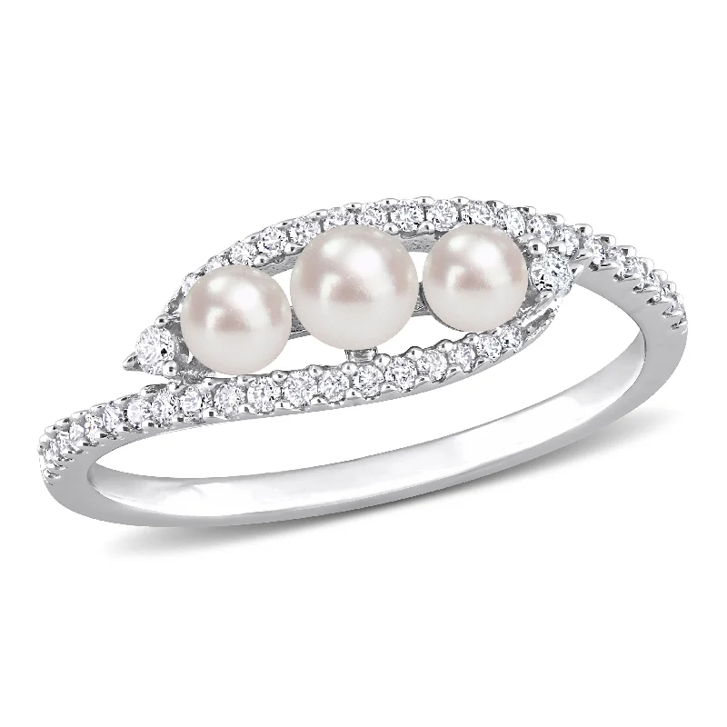 Pierced vent ring-Cultured Freshwater Pearl and 1/5 CT TDW Diamond Bypass Ring in 14k White Gold