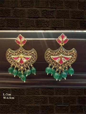 Steel toned earrings-Emerald drops rani and kundan earring with intricate design