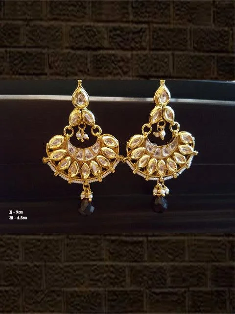 Scored groove earrings-Kundan pearl chandbali with hanging ruby bead