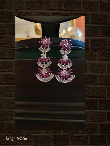 Pear-shaped zircon earrings-Black finish AD and ruby stone three tier earring